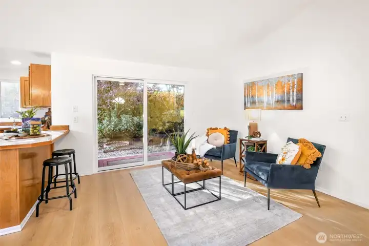 Second living space right off the kitchen with a slider door that allows access to back yard.