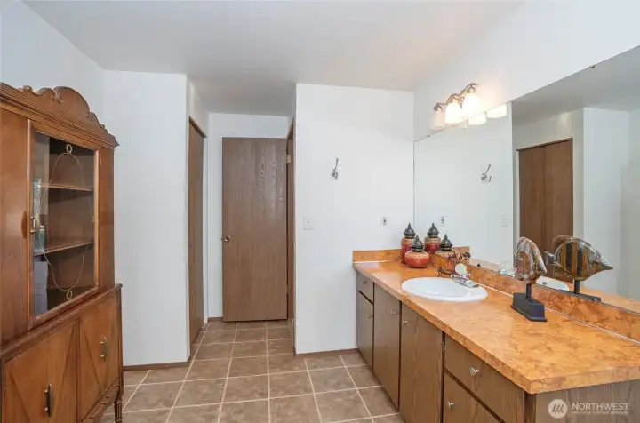 Guest bathroom accessible from living and guest bedroom