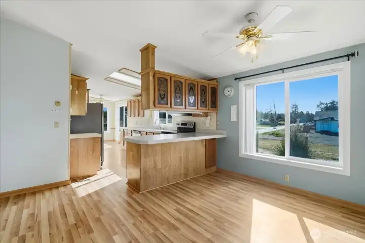 View of dining area and kitchen from livingroom.