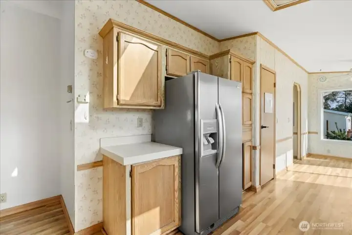 Kitchen with large walk-in pantry.