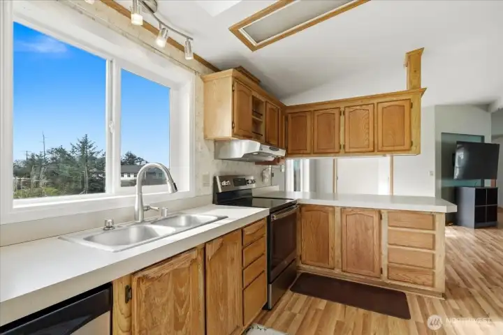 View of kitchen from walk-in pantry.