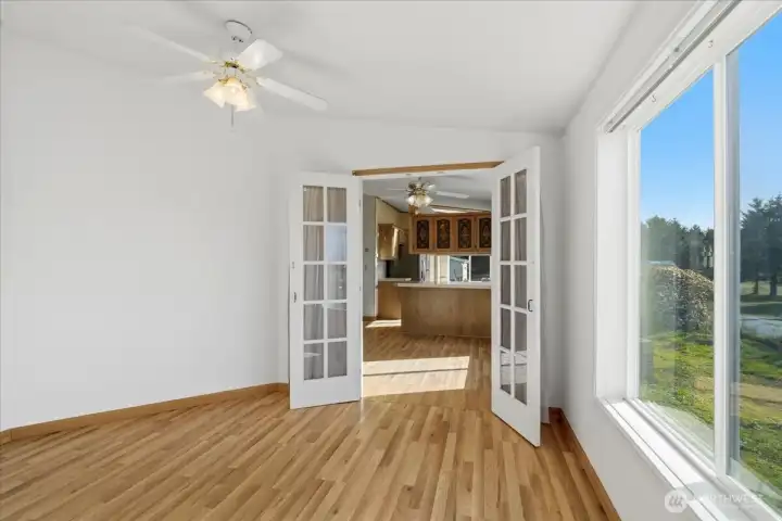 View from den with beautiful French doors.