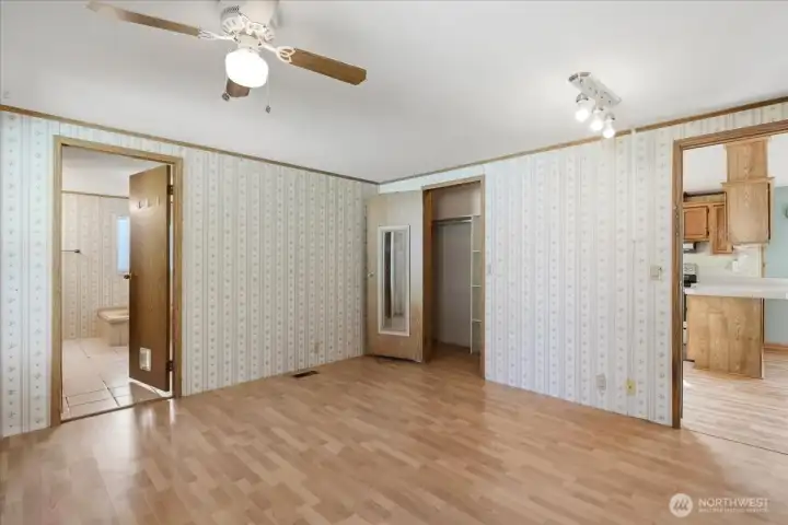 Primary bedroom with walk-in closet.