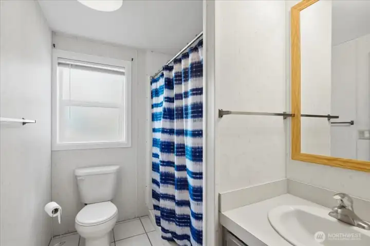 Bathroom with recently updated walk-in shower.