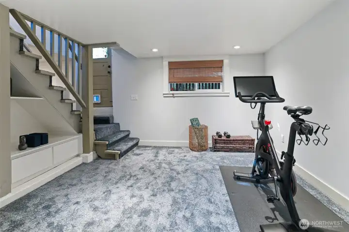 This area is on the lower level and is currently used as a home gym. It is freshly painted and has brand new carpeting.  Could be a Media room or play space too!