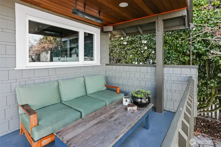 Shelter outdoors in this cozy covered portion of the main deck.  Outdoor heater keeps you toasty warm!