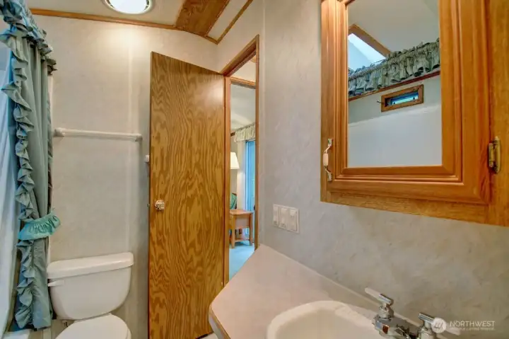 Bathroom with over the sink storage