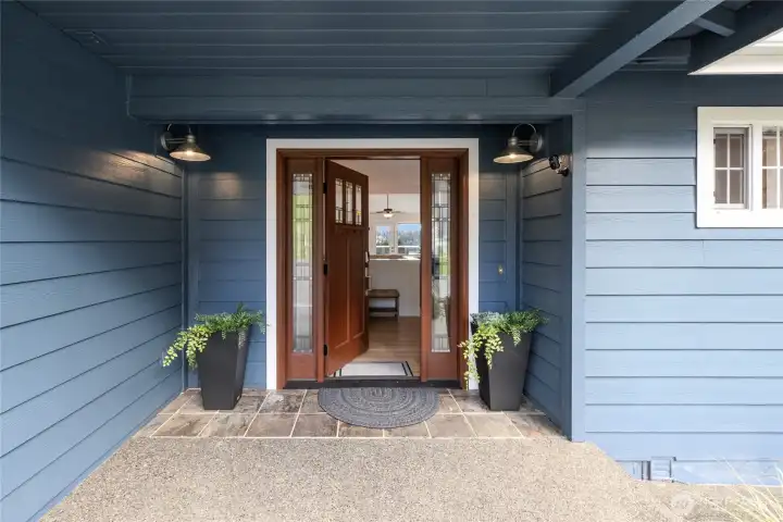 Covered entry with lovely curb appeal.