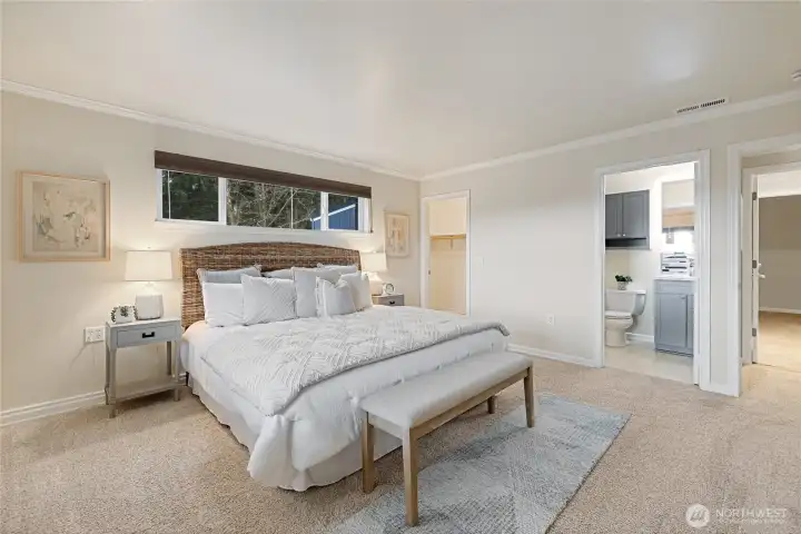 Notice the Full bath and walk in closet in this lower level primary bedroom.
