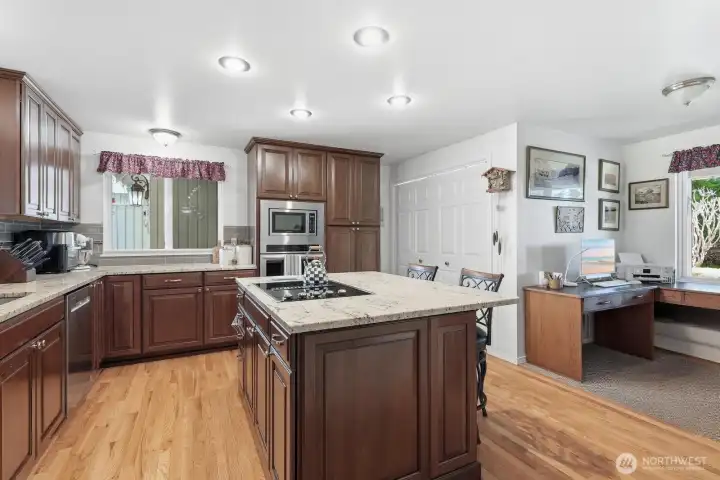 Fully remodeled featuring custom cabinetry, stainless steel appliances, and sleek slab granite.