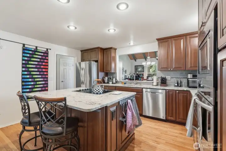 Abundant cabinetry and expansive prep space make this kitchen as functional as it is beautiful.
