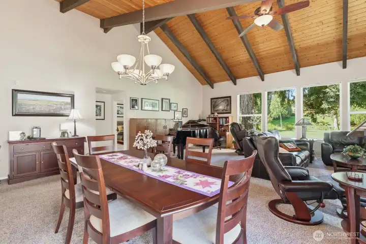 The dining room flows effortlessly into the massive living area, making it ideal for large-scale entertaining.