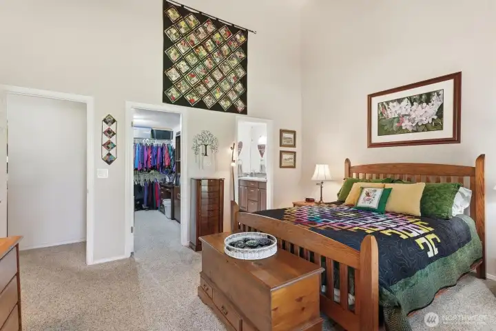 The primary bedroom features a large walk-in closet and an updated 3/4 bathroom.