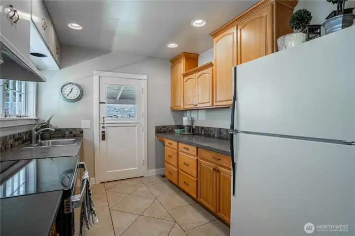 Kitchen features a Dutch Door to view deck