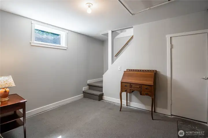 Lower level open space with wine cellar or pantry
