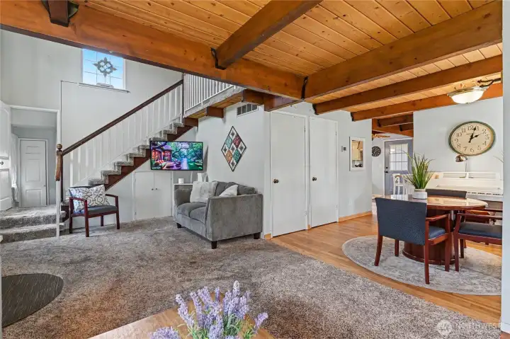 Living/dining stairs leading to 3 beds and 1 full bath.