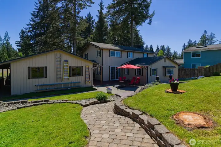 Another view of the backyard  showing the detached garage.