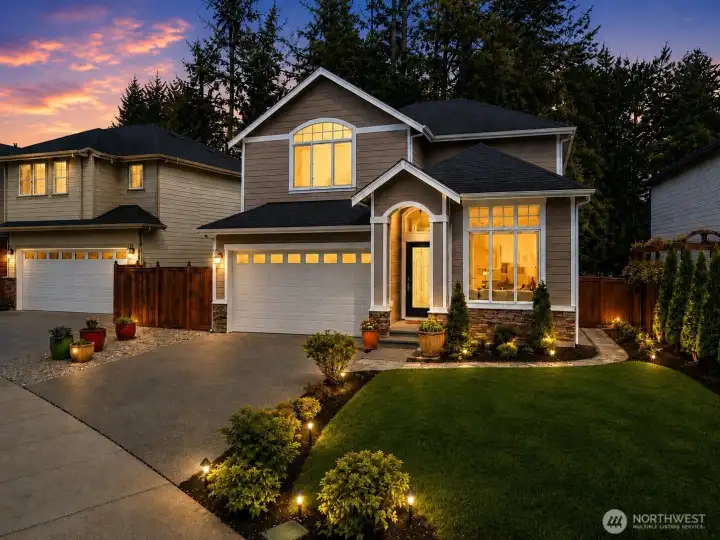 A warm glow emanates from this lovely home, .enhanced by landscape lighting and welcoming curb appeal. A warm glow emanates from this lovely home, .enhanced by landscape lighting and welcoming curb appeal.