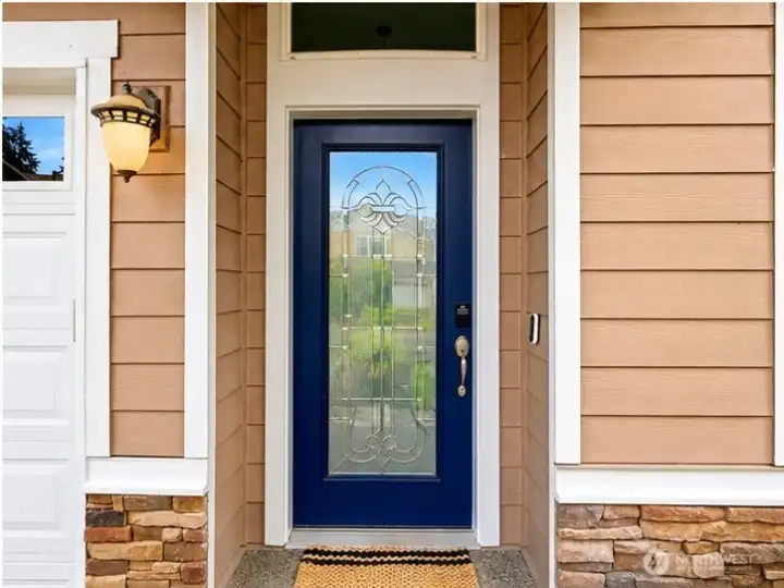 The statement front door hints at the attention to detail and thoughtful touches carried throughout the home. The statement front door hints at the attention to detail and thoughtful touches carried throughout the home.