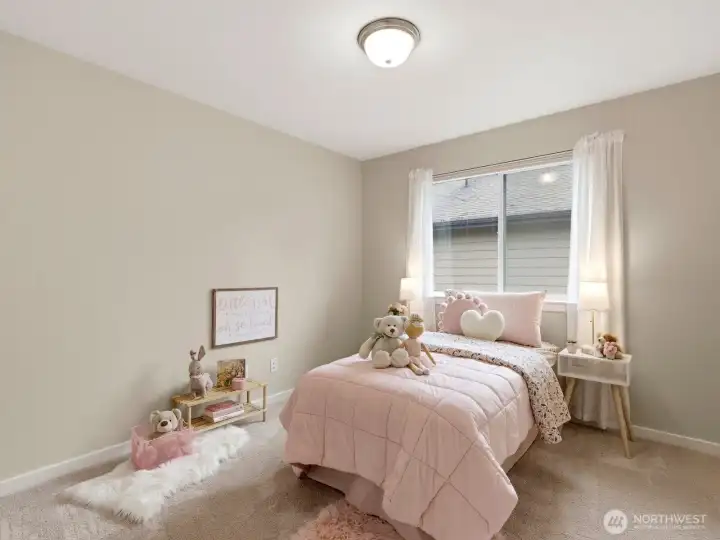 Bright secondary bedroom offering comfort, flexibility, and natural light. Bright secondary bedroom offering comfort, flexibility, and natural light.