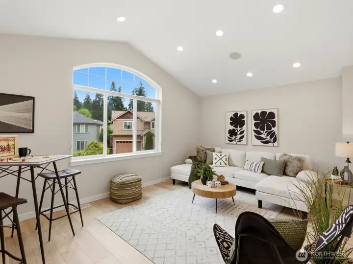 Expansive bonus room with soaring ceilings and an abundance of natural light. Expansive bonus room with soaring ceilings and an abundance of natural light.
