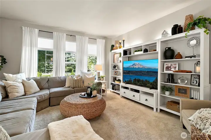 Expansive family room  with beautiful oversized windows.