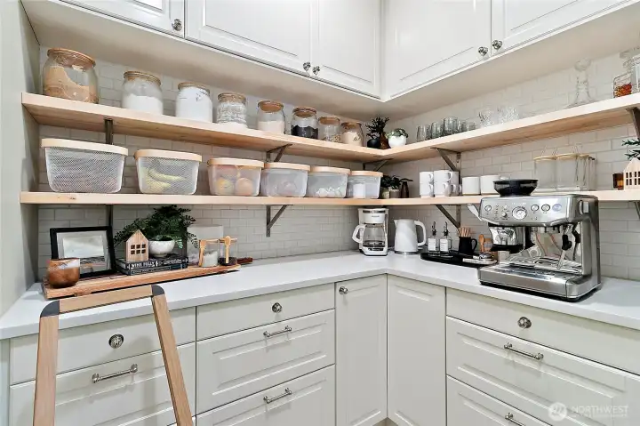 Designer inspired butler's pantry offering open display shelving and ample storage....perfect for all your small appliances!