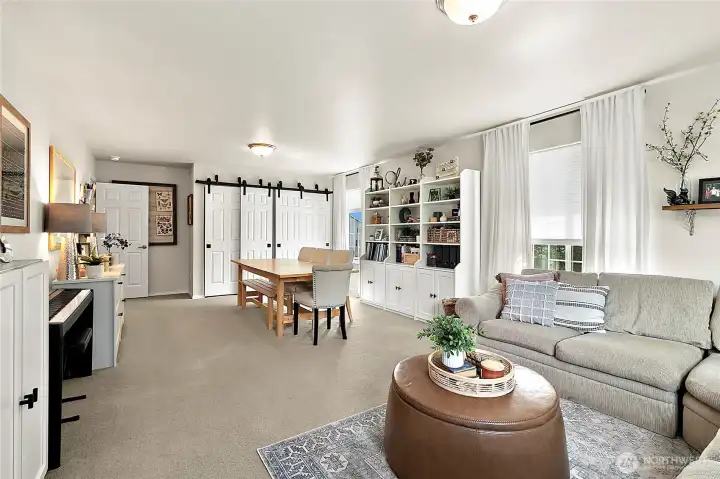 The 5th bedroom also features double closets.