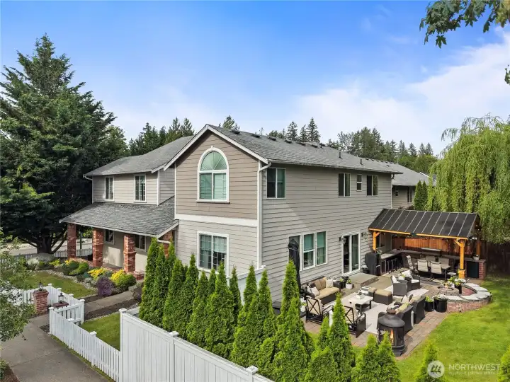 Ariel view showcasing the private backyard retreat & desirable corner-lot setting.