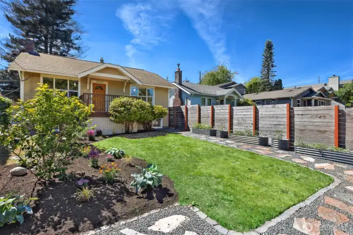 Fully Fenced Front Yard With Garden Space
