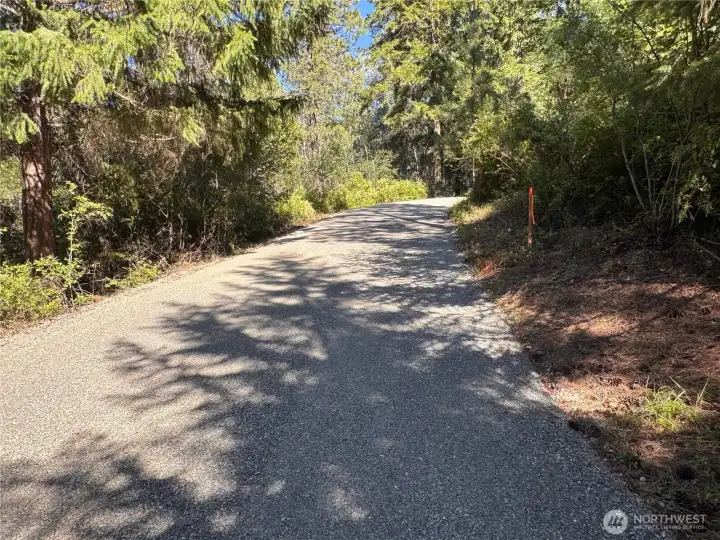 Extra wide new graveled access road.