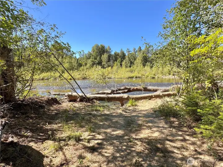 A rare opportunity to build your dream retreat surrounded by forest, river, and territorial views.
