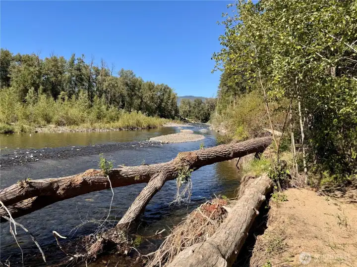 Beautiful river views enhance the property's natural charm and year-round appeal.