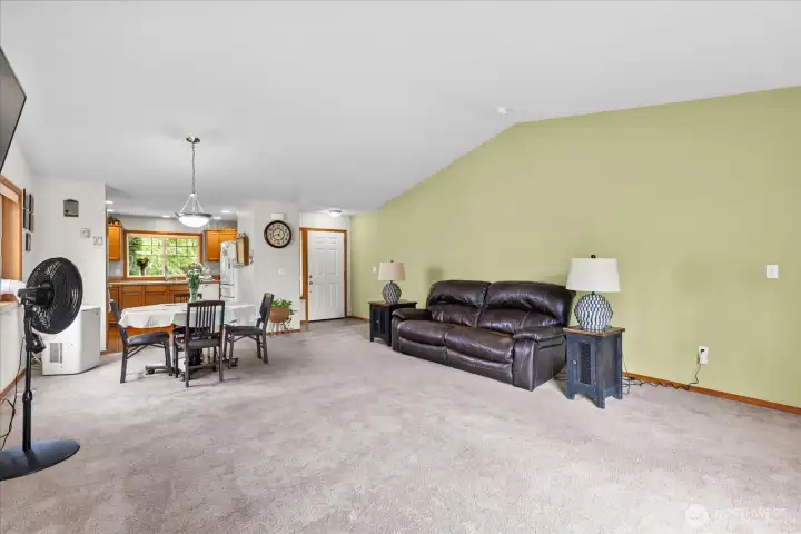 Vaulted ceilings make the room feel open and spacious.