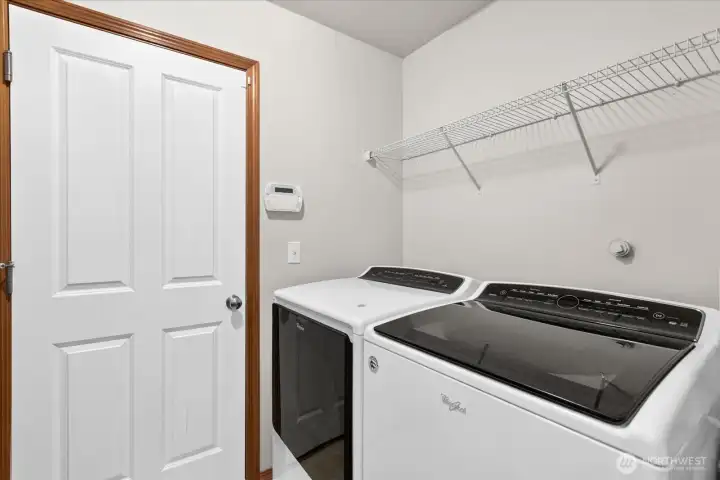 Laundry room with garage access