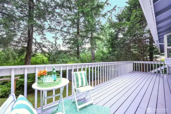 This is the view that changes everything. Stretching the full length of the home, this incredible deck quickly becomes an extension of your everyday living space. Morning coffee, weekend barbecues, dinner with friends or simply enjoying a quiet evening all come with an extraordinary natural backdrop. Beyond the railing, Glen Terra's neighborhood greenspace creates a beautiful transition to the Mullen Road Habitat beyond, giving this home a wonderfully peaceful connection to nature that's increasingly difficult to find. And yes...the deer really do wander through here, with owls making regular appearances as well. This is the view that changes everything. Stretching the full length of the home, this incredible deck quickly becomes an extension of your everyday living space. Morning coffee, weekend barbecues, dinner with friends or simply enjoying a quiet evening all come with an extraordinary natural backdrop. Beyond the railing, Glen Terra's neighborhood greenspace creates a beautiful transition to the Mullen Road Habitat beyond, giving this home a wonderfully peaceful connection to nature that's increasingly difficult to find. And yes...the deer really do wander through here, with owls making regular appearances as well.
