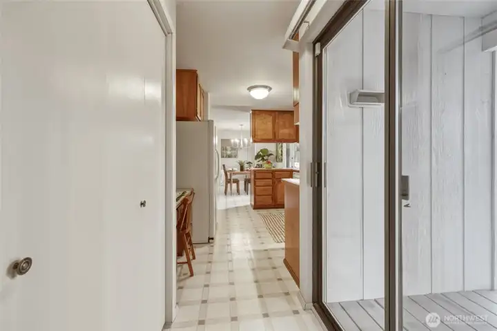 Everyone notices how easy a home makes everyday life, and this kitchen scores big points here. The attached 2-car garage is right behind us in this photo, with the walk-in pantry conveniently on our immediate left, tucked between the garage entry and the kitchen. Grocery day suddenly gets a whole lot easier when you're carrying everything in from Safeway (about 10 minutes away) or Costco (about 15 minutes away) and can unload almost immediately. The built-in desk is the perfect spot to drop your shopping list and receipts, while the sliding glass door offers quick access to the deck. And if everyone else is relaxing outside while you're unloading groceries...well...you know exactly where to find them. Everyone notices how easy a home makes everyday life, and this kitchen scores big points here. The attached 2-car garage is right behind us in this photo, with the walk-in pantry conveniently on our immediate left, tucked between the garage entry and the kitchen. Grocery day suddenly gets a whole lot easier when you're carrying everything in from Safeway (about 10 minutes away) or Costco (about 15 minutes away) and can unload almost immediately. The built-in desk is the perfect spot to drop your shopping list and receipts, while the sliding glass door offers quick access to the deck. And if everyone else is relaxing outside while you're unloading groceries...well...you know exactly where to find them.