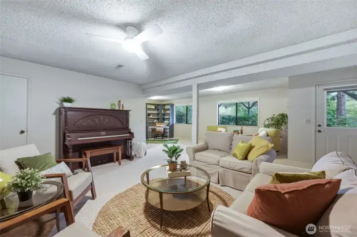 Here's another look at just how much flexibility this daylight basement offers. The private exterior entrance creates wonderful possibilities for multigenerational living, extended guests or future rental opportunities (buyers to verify intended use). With this much square footage, there's plenty of room to create separate living areas while still feeling connected to the rest of the home. One feature I don't want you to miss is the HUGE walk-in storage room tucked behind the door on the left. Real storage. Not "balance a few boxes on a shelf" storage. ?? Homes with this much flexibility tend to stay functional through every stage of life. Here's another look at just how much flexibility this daylight basement offers. The private exterior entrance creates wonderful possibilities for multigenerational living, extended guests or future rental opportunities (buyers to verify intended use). With this much square footage, there's plenty of room to create separate living areas while still feeling connected to the rest of the home. One feature I don't want you to miss is the HUGE walk-in storage room tucked behind the door on the left. Real storage. Not "balance a few boxes on a shelf" storage. ?? Homes with this much flexibility tend to stay functional through every stage of life.