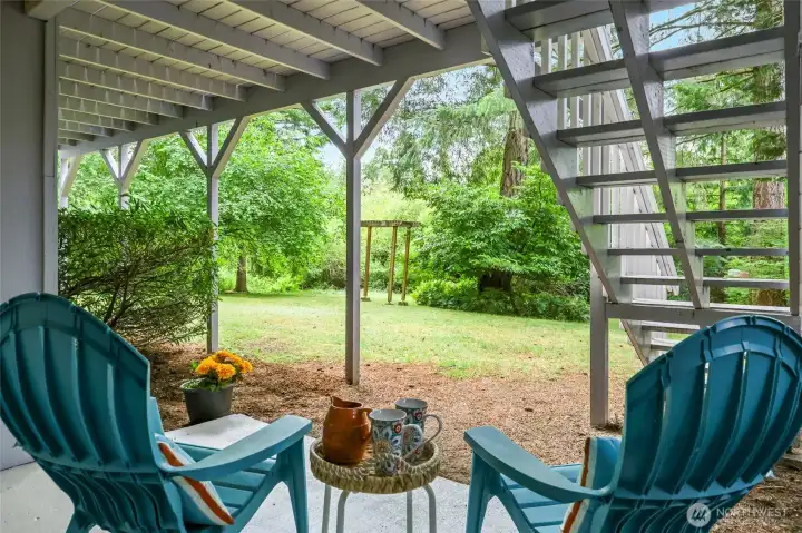One of the unexpected perks of a daylight basement is gaining a second outdoor living space. This covered patio stays cool on warm summer days and offers a front-row seat to the beautifully landscaped backyard, the charming arbor and the peaceful clearing beyond. Looking past the property, you'll appreciate the natural backdrop created by Glen Terra greenspace and the Mullen Road Habitat beyond. It's the kind of setting that makes you want to pull up a chair, take a deep breath and stay awhile. One of the unexpected perks of a daylight basement is gaining a second outdoor living space. This covered patio stays cool on warm summer days and offers a front-row seat to the beautifully landscaped backyard, the charming arbor and the peaceful clearing beyond. Looking past the property, you'll appreciate the natural backdrop created by Glen Terra greenspace and the Mullen Road Habitat beyond. It's the kind of setting that makes you want to pull up a chair, take a deep breath and stay awhile.