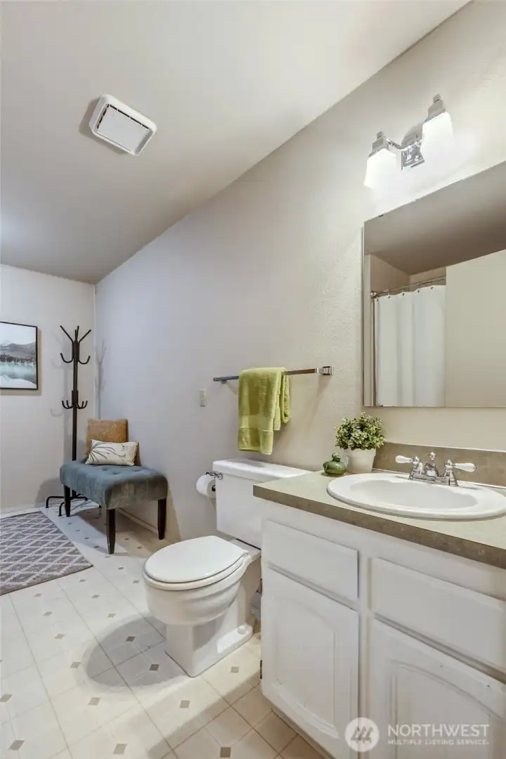 No need to send everyone upstairs. ?? This full bathroom in the daylight basement makes the lower level wonderfully self-sufficient, whether you're hosting overnight guests, creating multigenerational living space or simply enjoying movie nights downstairs. Durable vinyl flooring makes everyday maintenance easy, while the full tub/shower combination adds even more flexibility. No need to send everyone upstairs. ?? This full bathroom in the daylight basement makes the lower level wonderfully self-sufficient, whether you're hosting overnight guests, creating multigenerational living space or simply enjoying movie nights downstairs. Durable vinyl flooring makes everyday maintenance easy, while the full tub/shower combination adds even more flexibility.