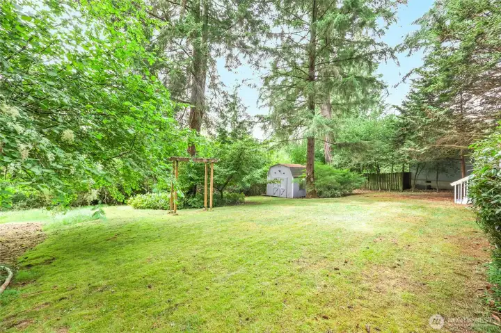 Don't overlook this backyard shed because it's so much more than a place to stash the lawn mower. Equipped with electricity, lighting, a large window and an upper loft for additional storage, it's ready to become whatever you need it to be. Workshop? Gardening headquarters? Hobby space? Bike storage? Seasonal décor? Maybe you've even dreamed of creating your own backyard studio or office (buyers to verify any intended use). The possibilities are almost as flexible as the floor plan inside the home. Don't overlook this backyard shed because it's so much more than a place to stash the lawn mower. Equipped with electricity, lighting, a large window and an upper loft for additional storage, it's ready to become whatever you need it to be. Workshop? Gardening headquarters? Hobby space? Bike storage? Seasonal décor? Maybe you've even dreamed of creating your own backyard studio or office (buyers to verify any intended use). The possibilities are almost as flexible as the floor plan inside the home.