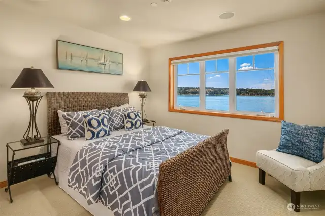 Upper floor guest bedroom with gorgeous lake views.