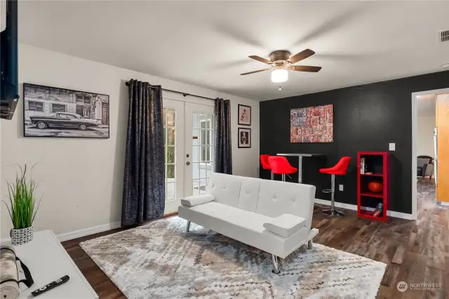 Family room with french doors leading to the back deck