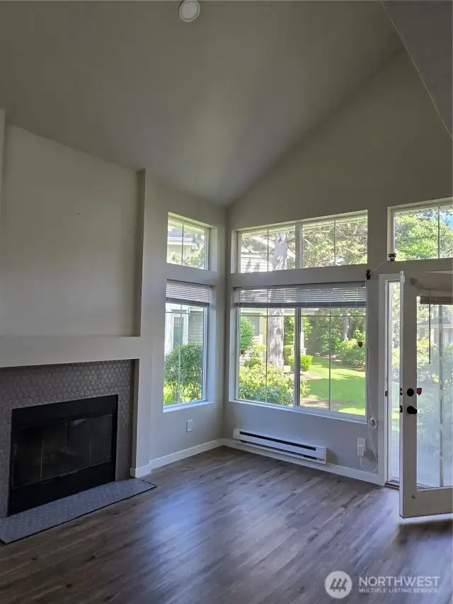 living room with vaulted ceilings