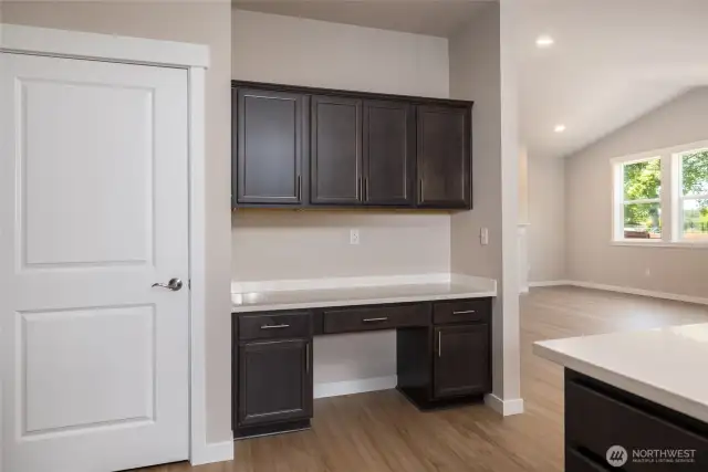 This home has a built in desk and pantry