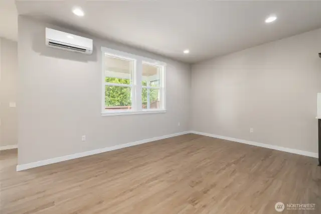 The dining room can hold a long table, if needed and has wall space for a hutch or piano.