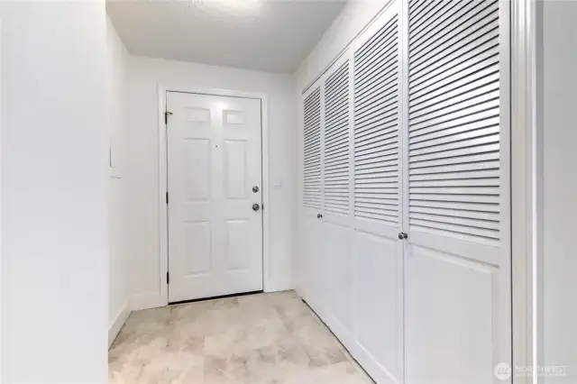 Utility closet on the right, new flooring, fresh paint throughout