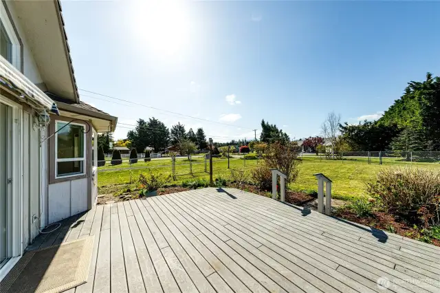 Deck is just outside your patio door.  Enjoy your fenced yard, bird watching and all of the panoramic views.