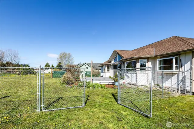 This large gate provides easy access to your backyard.