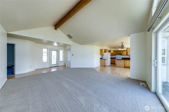 Easy flow and access from living room to dining nook and kitchen